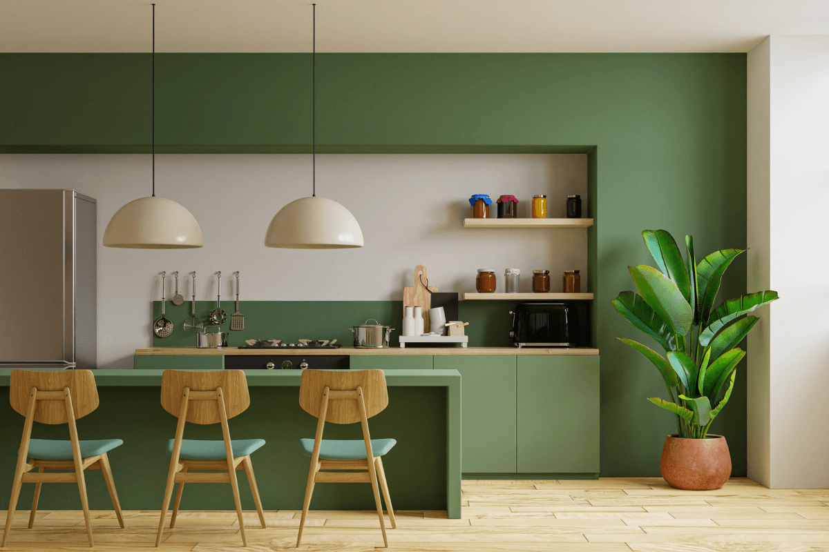 Imagem de uma cozinha pronta e decorada com exemplo de luminária para cozinha simples verde.