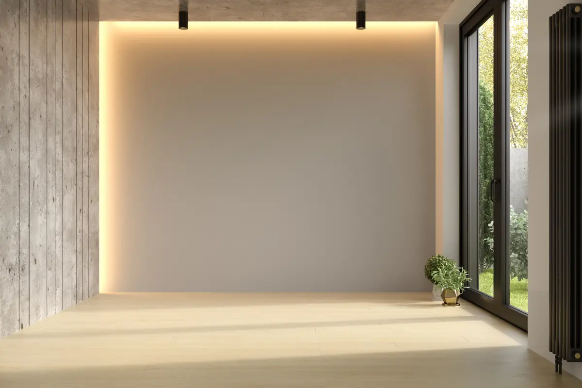 Drywall é realmente a melhor opção para quartos e salas? Detalhe ampliado de uma parede de drywall com iluminação estratégica, destacando sua textura. Foto: Reprodução / Canva Pro.